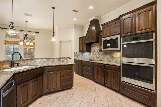 unfurnished dining area with crown molding, a healthy amount of sunlight, light tile patterned floors, and an inviting chandelier