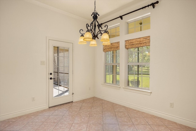 interior space featuring ornamental molding, light tile patterned flooring, and baseboards