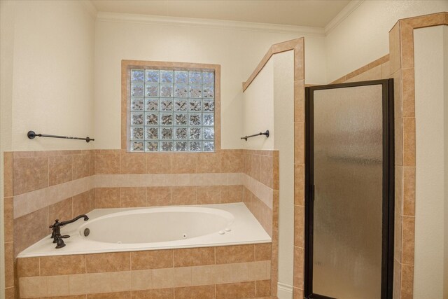 bathroom featuring crown molding and independent shower and bath