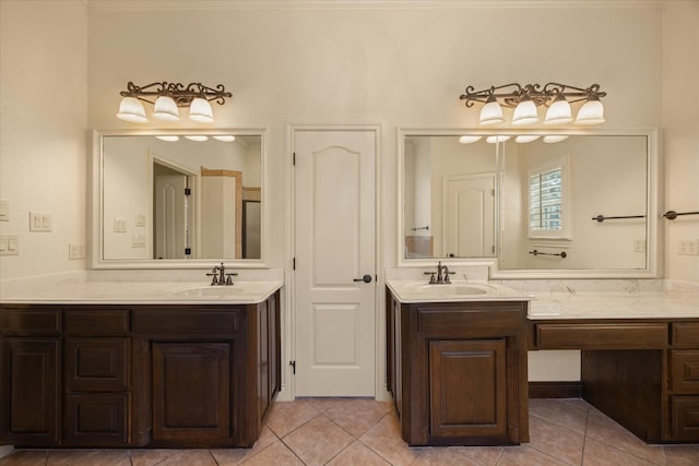 full bathroom featuring tile patterned flooring and vanity