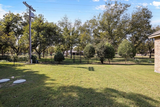 view of yard featuring fence