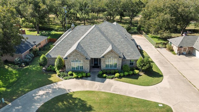 view of home's exterior with a yard and a garage