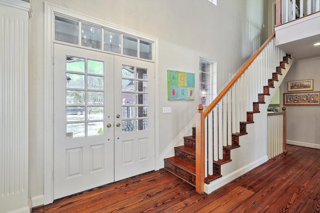 entryway featuring french doors and dark hardwood / wood-style floors