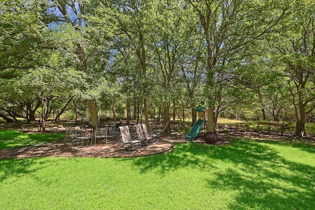 view of yard with a playground