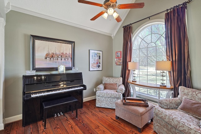 sitting room with ceiling fan, lofted ceiling, crown molding, and dark hardwood / wood-style flooring