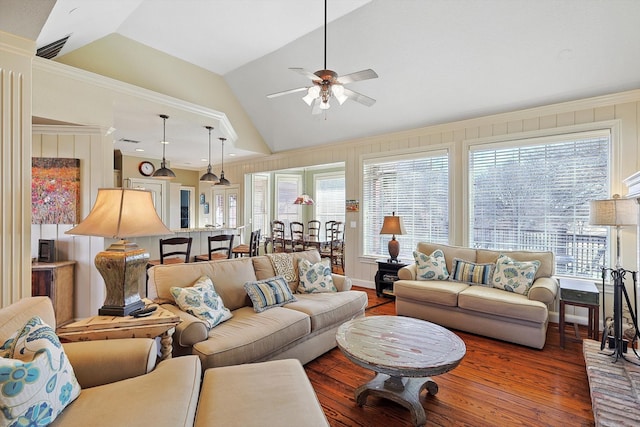 living room featuring ornamental molding, lofted ceiling, ceiling fan, and hardwood / wood-style floors