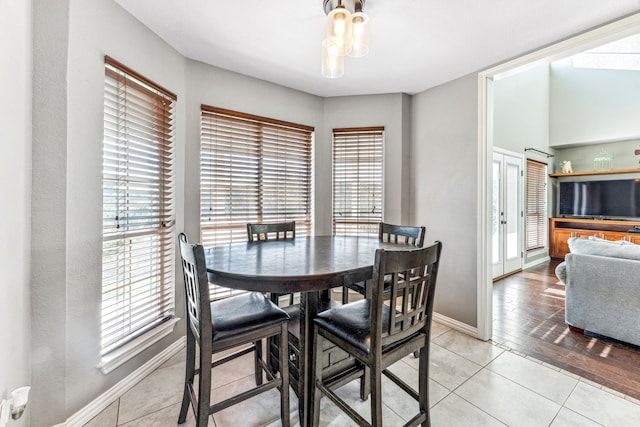 dining room with light wood-type flooring