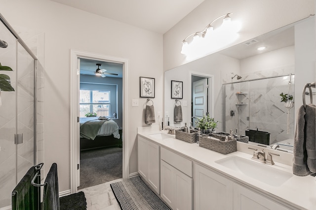 bathroom with vanity, ceiling fan, and walk in shower