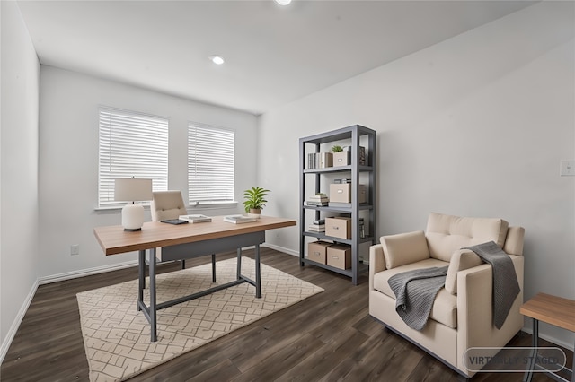 home office with dark hardwood / wood-style flooring