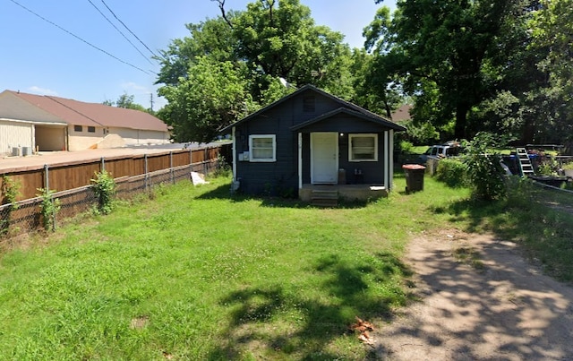 exterior space with a yard