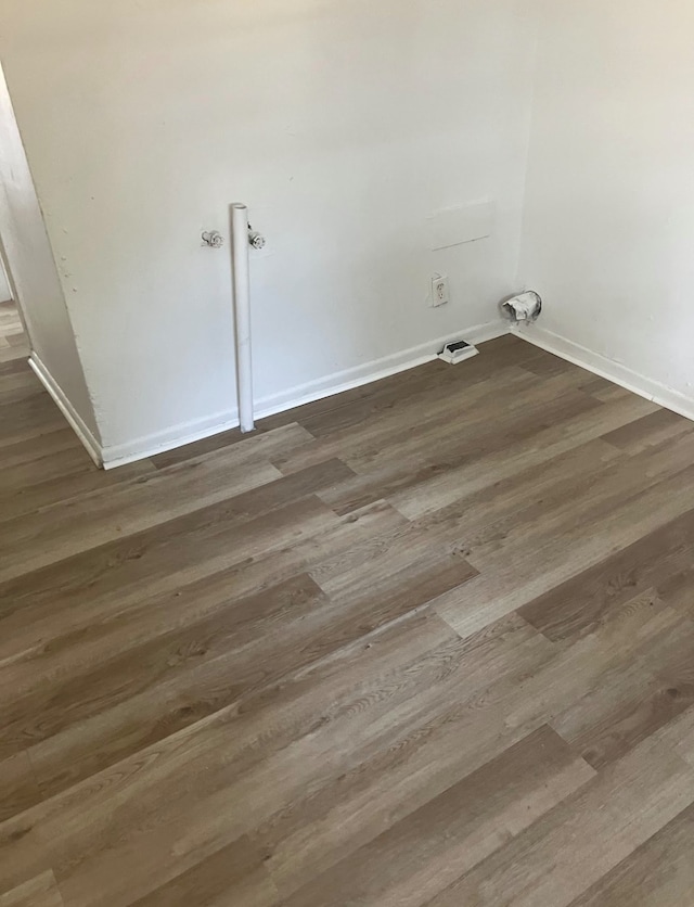 laundry room featuring hookup for a washing machine and dark hardwood / wood-style flooring