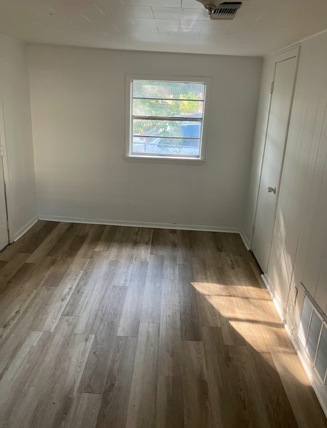 unfurnished room featuring light hardwood / wood-style flooring