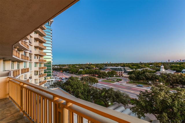 view of balcony at dusk