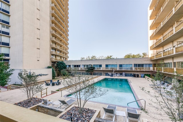 view of pool featuring a patio