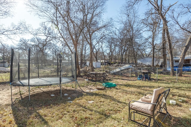 view of yard with a trampoline