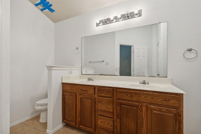 bathroom with vanity, lofted ceiling, shower / tub combination, and tile patterned floors