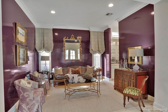 living room with ornamental molding