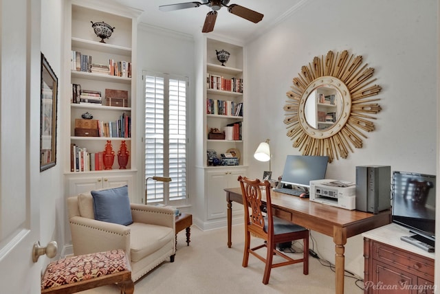 carpeted office with crown molding, ceiling fan, and built in shelves