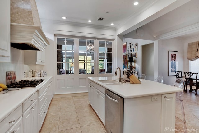 kitchen featuring white cabinets, light tile patterned flooring, sink, a center island with sink, and stainless steel appliances