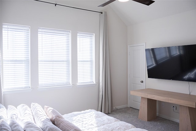 carpeted bedroom featuring vaulted ceiling and ceiling fan