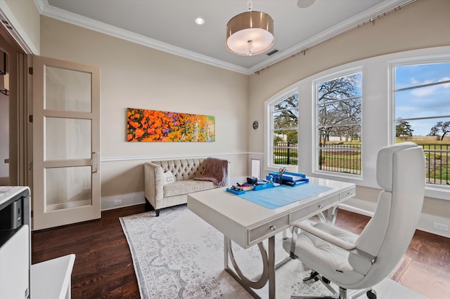 office featuring crown molding, plenty of natural light, and dark hardwood / wood-style flooring