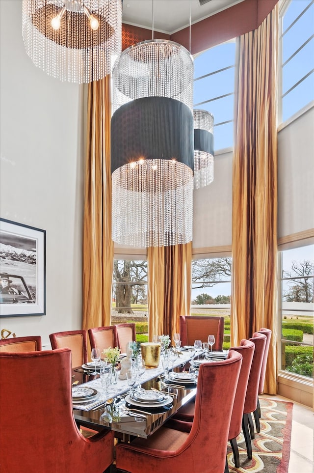 dining room with a chandelier and a wealth of natural light