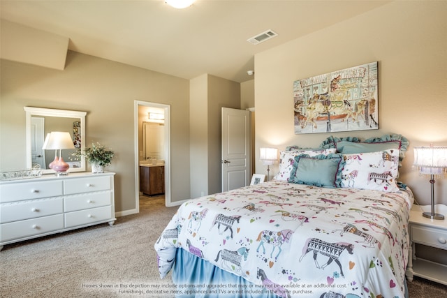 carpeted bedroom with connected bathroom