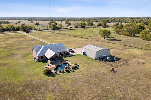 birds eye view of property featuring a rural view