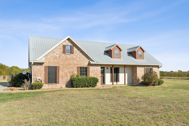 view of front of home featuring a front lawn