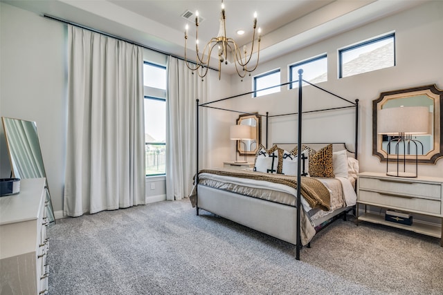 bedroom featuring carpet floors, an inviting chandelier, and a high ceiling