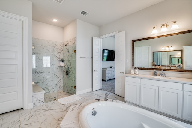 bathroom with shower with separate bathtub and vanity