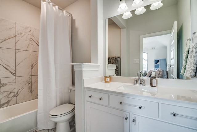 full bathroom featuring shower / bath combo, vanity, and toilet