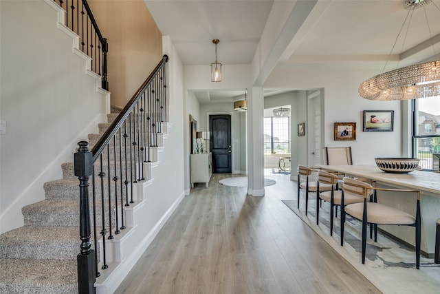 entryway with light hardwood / wood-style floors