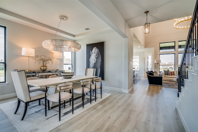 dining area featuring light wood-type flooring