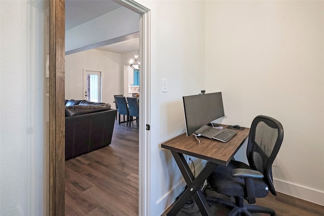 office area featuring dark hardwood / wood-style floors and an inviting chandelier