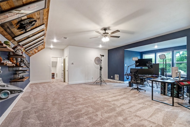 interior space featuring carpet floors, lofted ceiling, and ceiling fan