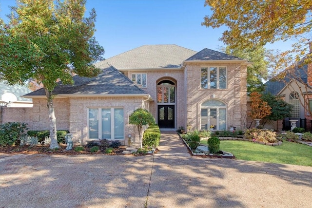 view of front of home with a front yard