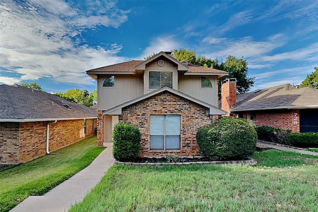 front facade with a front lawn