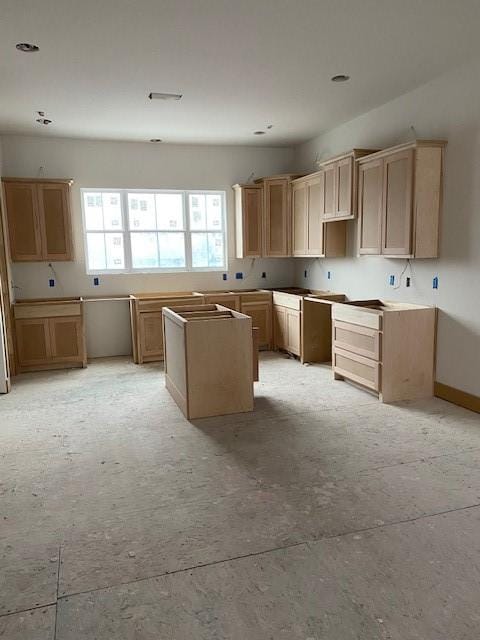 kitchen featuring light brown cabinets