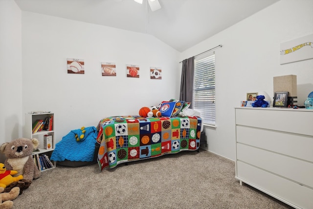 carpeted bedroom featuring ceiling fan and vaulted ceiling