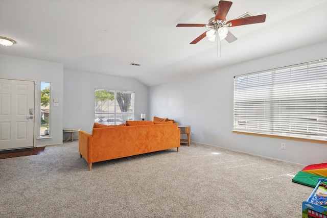 carpeted living room featuring lofted ceiling and ceiling fan