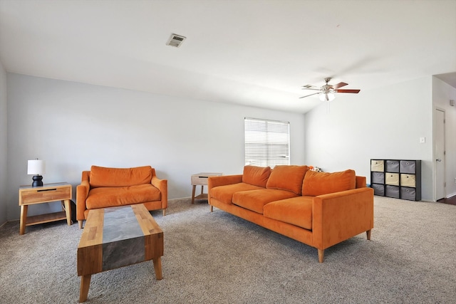 carpeted living room featuring ceiling fan