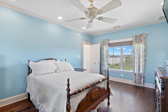 bedroom with dark hardwood / wood-style floors, crown molding, and ceiling fan