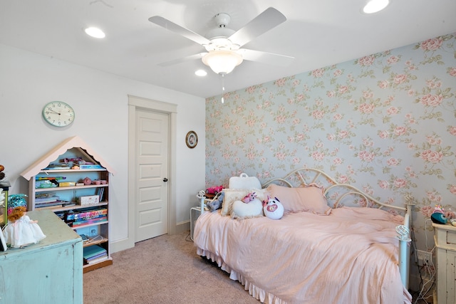 bedroom with light colored carpet and ceiling fan