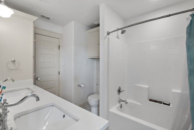 full bathroom with vanity, toilet, and shower / bath combo