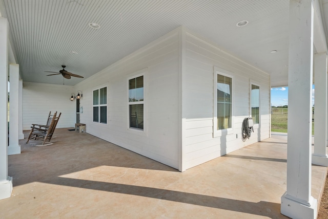 view of patio featuring ceiling fan