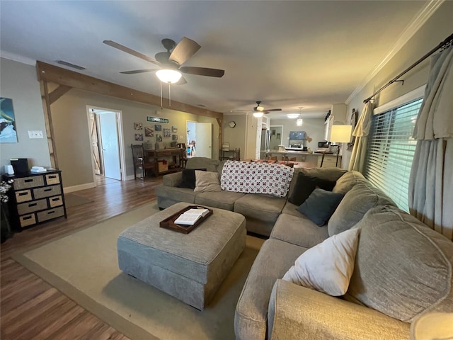 761 S Pacific St, Canton, TX 75103 - living area with ceiling fan, wood finished floors, crown molding, and baseboards