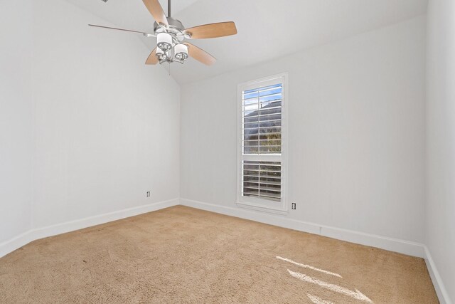 unfurnished living room with hardwood / wood-style floors, vaulted ceiling, ceiling fan, crown molding, and a barn door