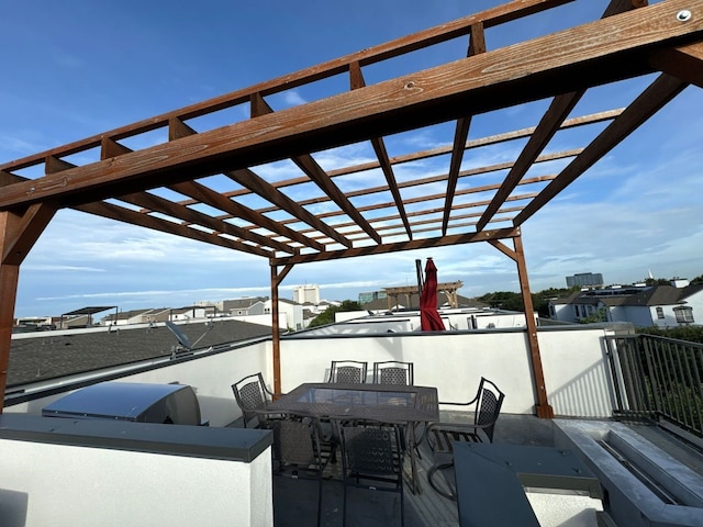 view of patio / terrace with a pergola and area for grilling