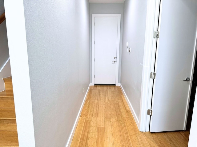 corridor featuring light hardwood / wood-style flooring